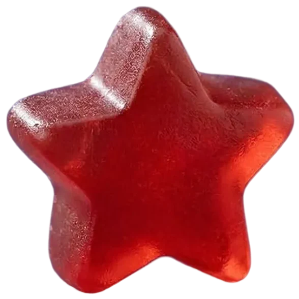 A close-up of a star-shaped strawberry NightBloom sleep gummy