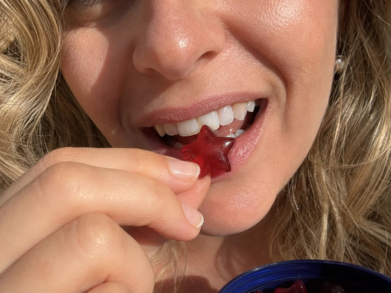Close-up of a star-shaped strawberry NightBloom sleep gummy