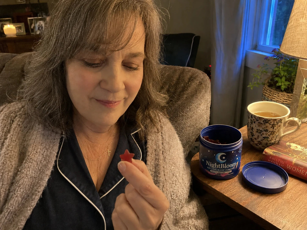 A woman winding down her evening at home with NightBloom as part of her nightly routine